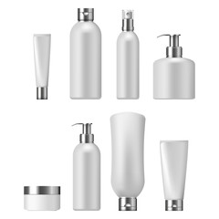 Set of cosmetic packaging with silver caps, isolated on white background. Cosmetic package for cream,  shampoo, liquid soap and spray