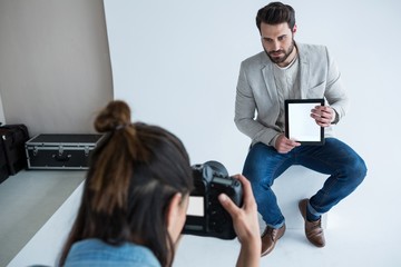 Male model posing for a photoshoot