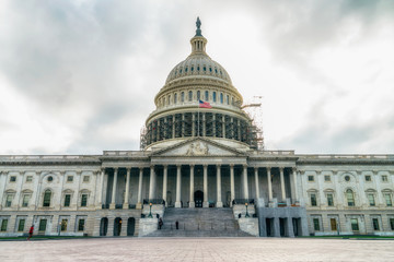 WASHINGTON DC, USA The United States Capitol view from the street. In 2014, scaffolding was erected around the dome for a restoration project scheduled to be completed by 2017. 