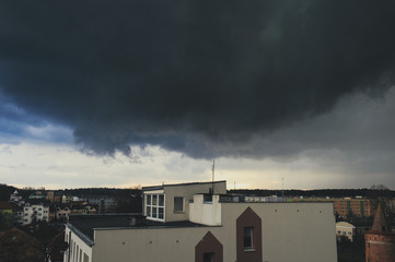 Fototapeta premium Storm dark clouds over city