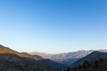 Naklejka na ściany i meble Tian Shan mountains view from Kamchik Pass in Uzbekistan