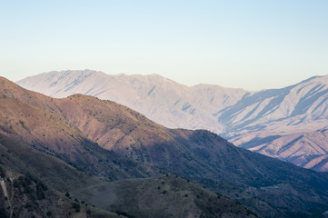 Fototapeta na wymiar Tian Shan mountains view from Kamchik Pass in Uzbekistan