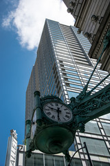 Fototapeta na wymiar Marshall Field's famous clock in Chicago (view from below)