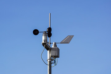 Devices meteorological station on the blue background of the sky