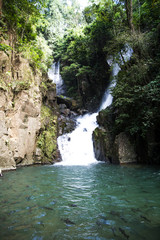 Fototapeta na wymiar Waterfall in Thailand with fish