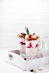 dessert in a glass on a wooden tray