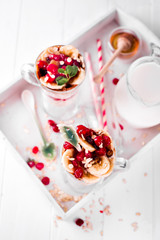 dessert in a glass on a wooden tray