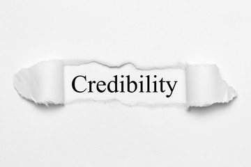 Credibilty on white torn paper