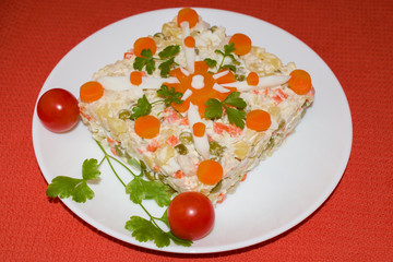 Salad of boiled chicken with boiled carrots, potatoes, egg and cucumber 