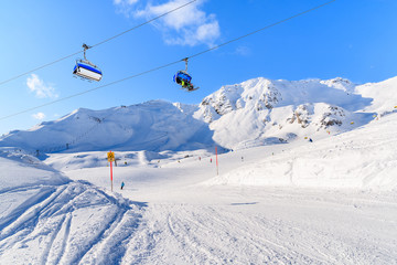 Fototapeta na wymiar View of chairlifts and beautiful winter scenery in Obertauern ski resort, Austria