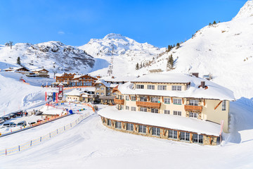 View of mountain hotels and restaurants covered with fresh snow in Obertauern winter resort, Austria