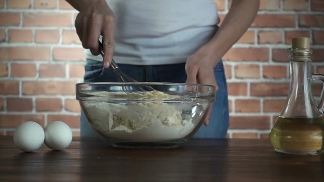 Girl preparing dough for italian pizza, slow motion hd video