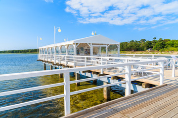 Cafe bar on pier in Jurata on sunny summer day, Baltic Sea, Poland