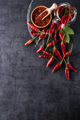 Vegetables. Peppers, tomatoes, garlic, onions on a black backgro