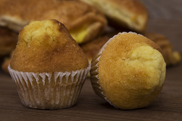sweet cupcakes on wood