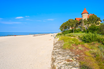 View of Leba beach and famous hotel Neptun, Baltic Sea, Poland © pkazmierczak