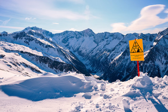 Sign warning of avalanche danger in Austrian Alps during winter ski season, Ankogel area, Austria