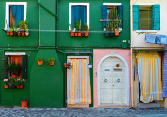 BURANO, ITALY - 2 Septenber,  2016.Beautiful facade in Veneto, Burano Island. Decorative textured...