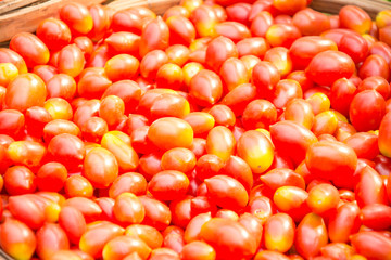  red tomatoes background. Group of tomatoes