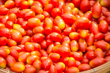  red tomatoes background. Group of tomatoes