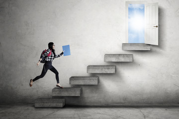 High school student leads to door © Creativa Images