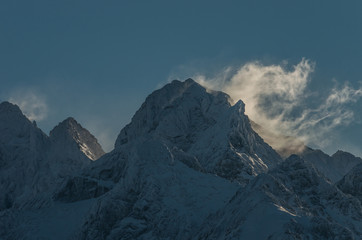 High Tatra mountains in clouds, winter landscape of Ganek peak - obrazy, fototapety, plakaty