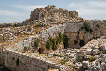 Fototapeta na wymiar Ruins of Syracuse ancient fortifications, Sicily island, Italy
