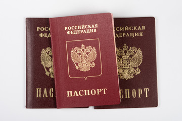 Three passport of the citizen of the Russian Federation on a white background