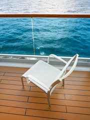 chair on balcony of cruise liner
