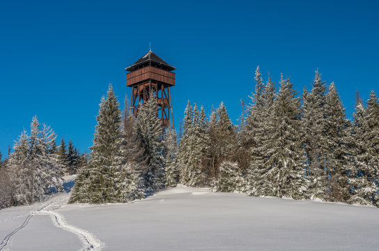 Observation tower on the top of the Luban peak in Gorce mountains, Poland, winter