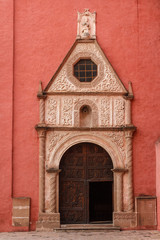 Door of the typical colonial church in Huichapan, Mexico
