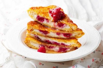 French toast stuffed ricotta and raspberry.