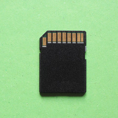 SD flash card over green