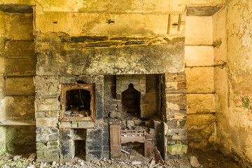 Fototapeta na wymiar Derelict interior, fireplace