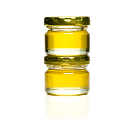 Transparent jar of liquid honey