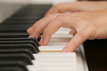 Fototapeta na wymiar Close-up piano, white and black keyboard