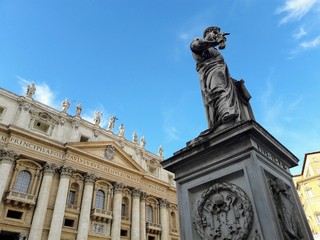 Fototapeta premium St. Peter's Basilica and statue of Pope Pius IX in St. Peter's Square Vatican City, Italy