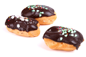 Three custard cookies with Christmas topping