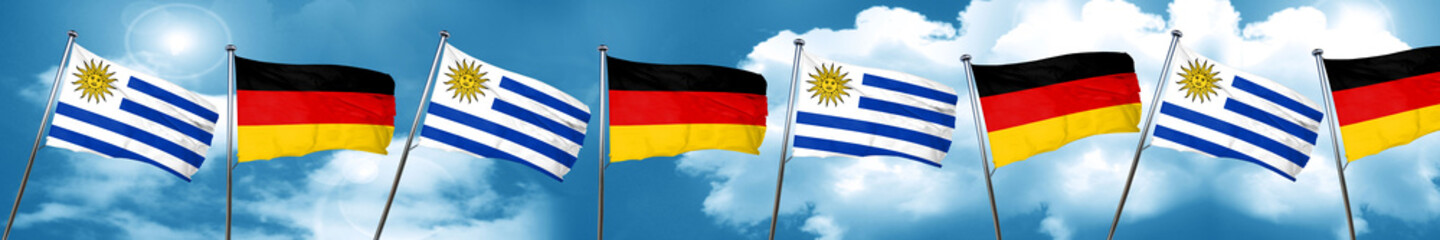 Uruguay flag with Germany flag, 3D rendering