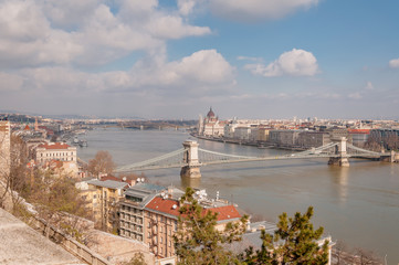 Fototapeta na wymiar Panoramic overview of Budapest on foreground the Parliament building and chain bridge