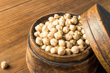 Portion of Chick Peas in wooden bowl