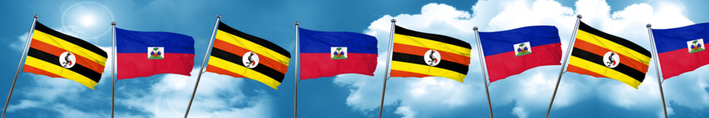 Uganda flag with Haiti flag, 3D rendering