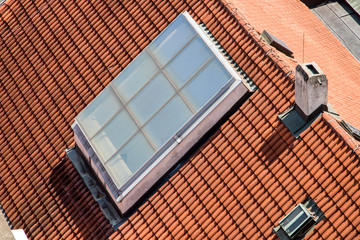 Large window on the roof of a historic house in downtown