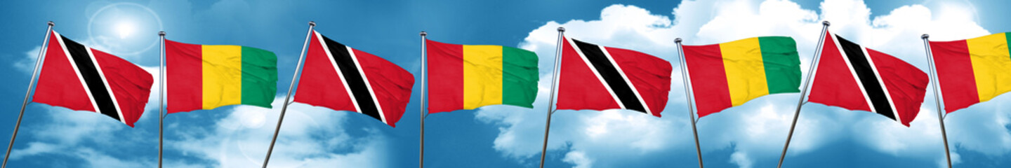 Trinidad and tobago flag with Guinea flag, 3D rendering