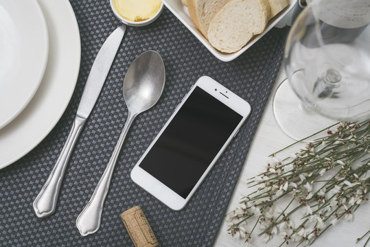 Smartphone mockup in restaurant