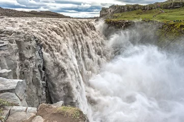 Foto op Plexiglas Dettifoss is a waterfall in Vatnajökull National Park in Northeast Iceland, and is reputed to be the most powerful waterfall in Europe. © gekkon4ik