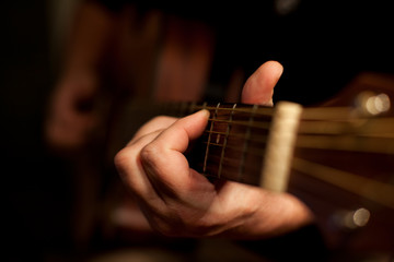  Close-up of men playing acoustic guitar