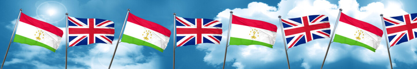 Naklejka na ściany i meble Tajikistan flag with Great Britain flag, 3D rendering