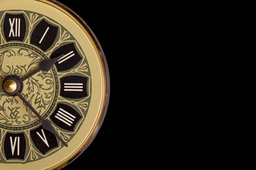 Fototapeta na wymiar Vintage Look Clock close up on black background