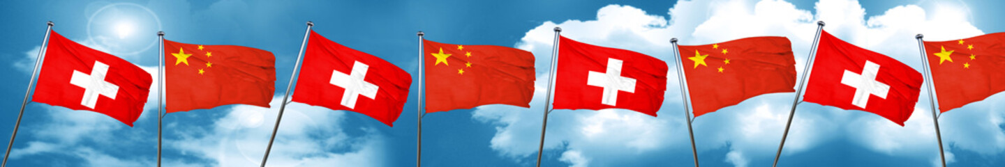 switzerland flag with China flag, 3D rendering